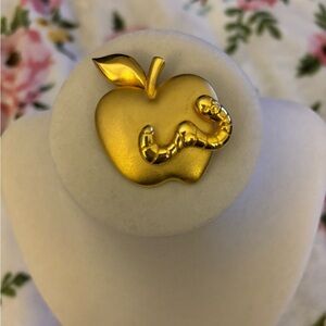 Gold tone Apple worm brooche